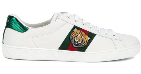 fake gucci tiger trainers